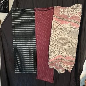 Lot of infinity scarves.